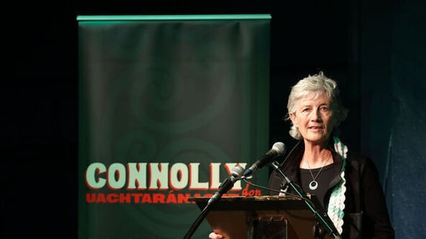 Catherine Connolly speaks from a podium at her campaign launch in Dublin