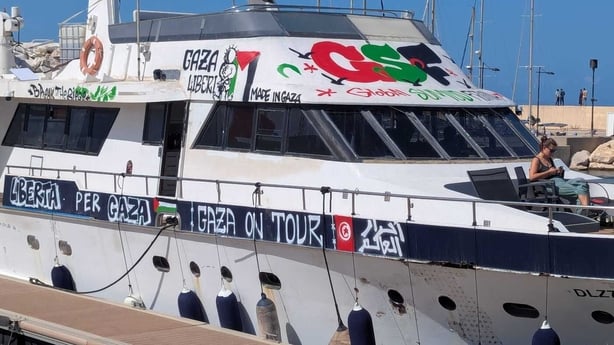 A boat covered in pro-Gaza murals