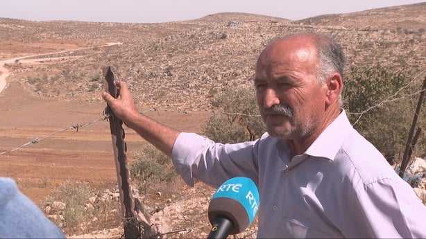 Deputy head of municipality Marzouq Abu Naem standing in the West Bank.