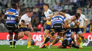 26 September 2025; Diarmuid Mangan of Leinster is tackled by Adré Smith of DHL Stormers during the United Rugby Championship match between DHL Stormers and Leinster at DHL Stadium in Cape Town, South Africa. Photo by Shaun Roy/Sportsfile