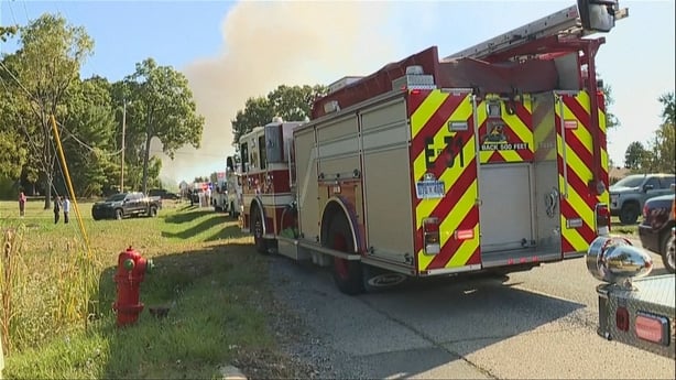Fire brigade at the scene of a fire and shooting in Michigan