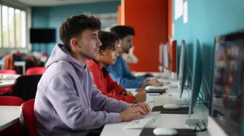Getty Images A generic photo of students at computers in a classroom