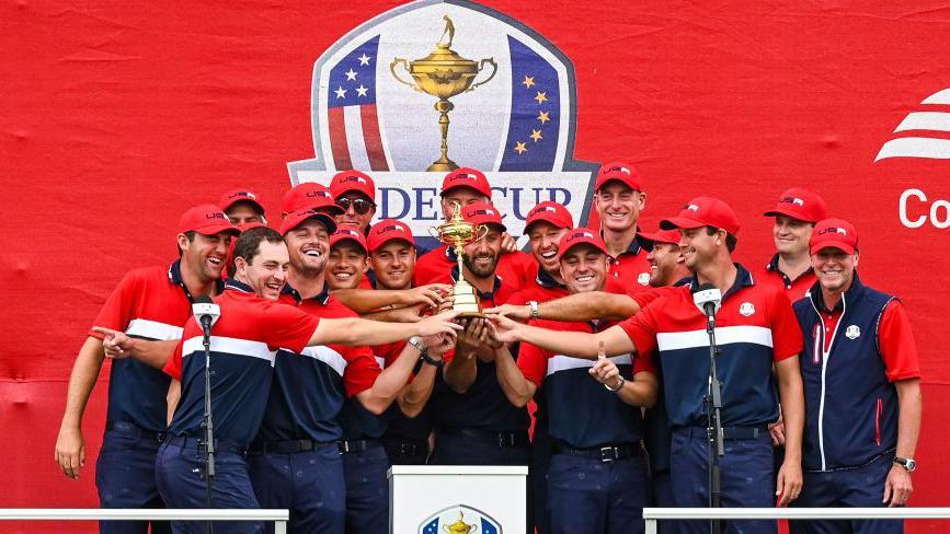 Team USA celebrating with the Ryder Cup in 2021.