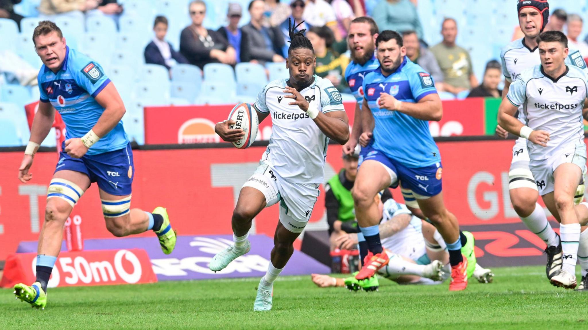 Dan Kasende breaks free before putting Kieran Williams over for an Ospreys try against Bulls